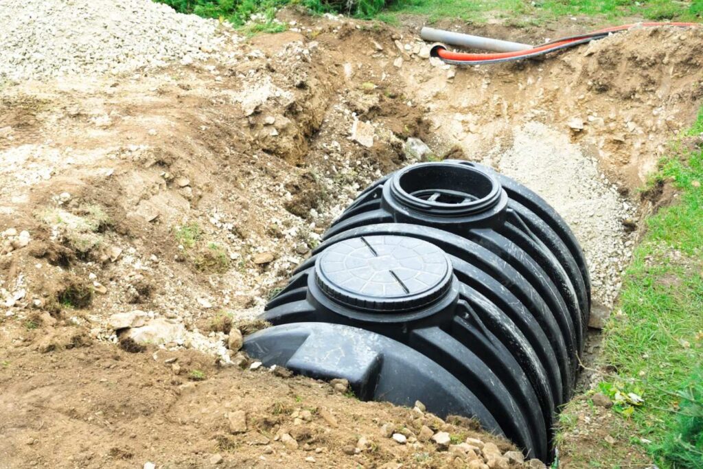 A septic tank installed in the ground ready to be covered.