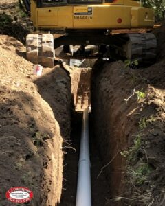 machinery sitting above over hole