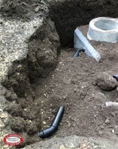 Septic tank under the ground covered in dirt